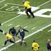 Former University of Michigan football players participate in the annual alumni flag football game before spring practice at Michigan Stadium on Saturday, April 13, 2013. Melanie Maxwell I AnnArbor.com